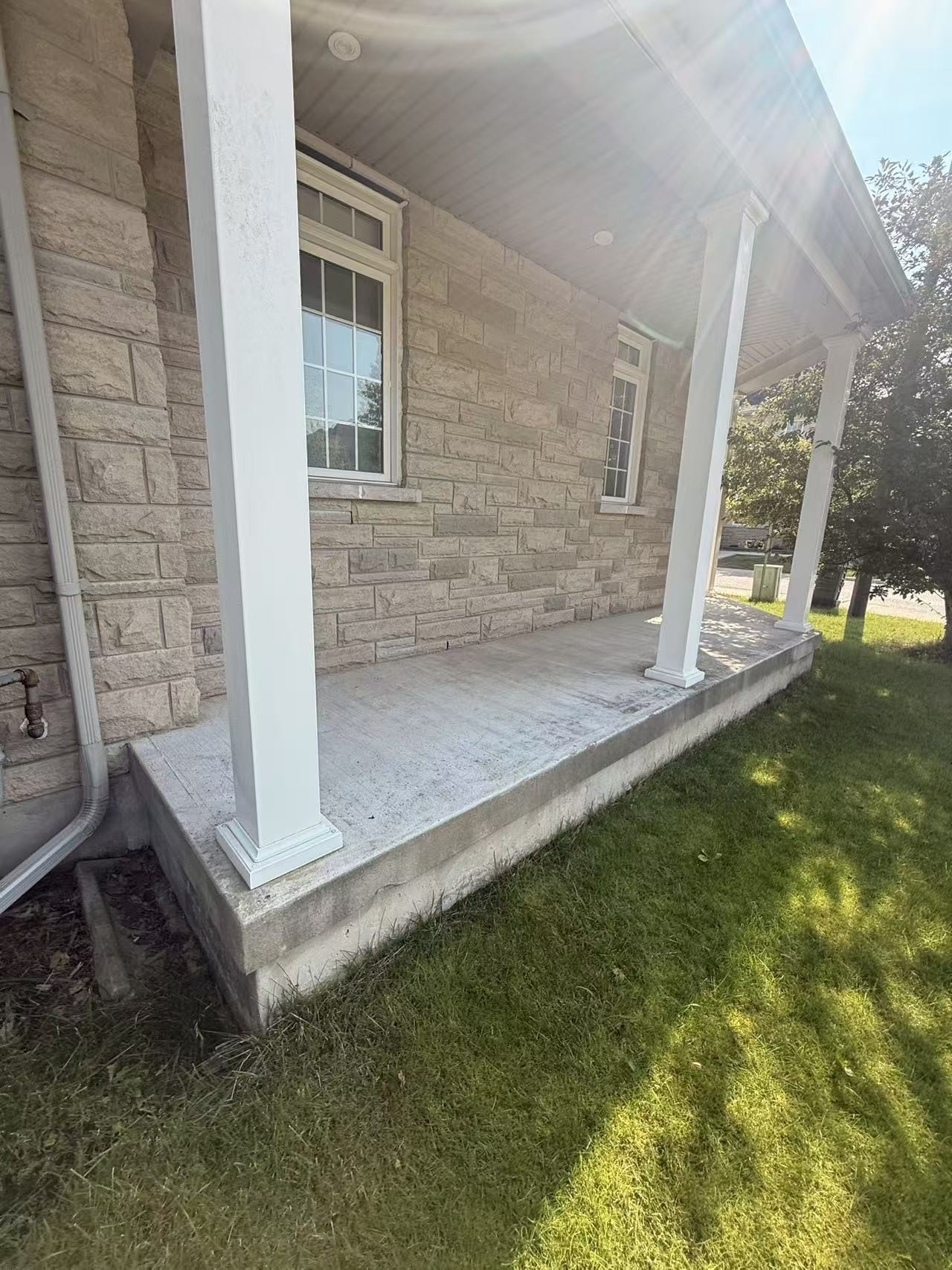 Front porch — concrete to porcelain — before